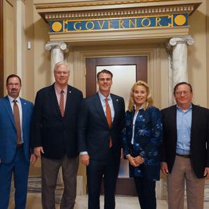 Stitt medical cost transparency presser